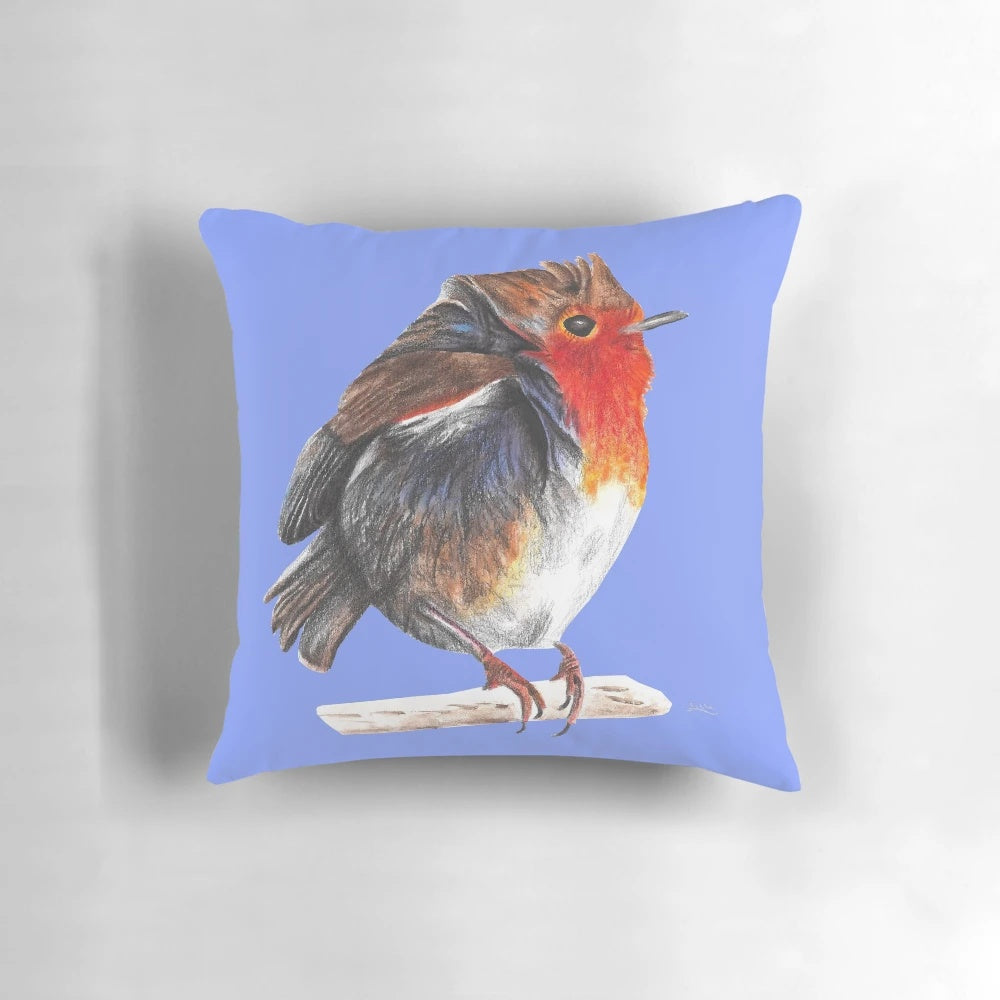 Decorative pillow featuring a beautiful robin bird in a winter nature scene