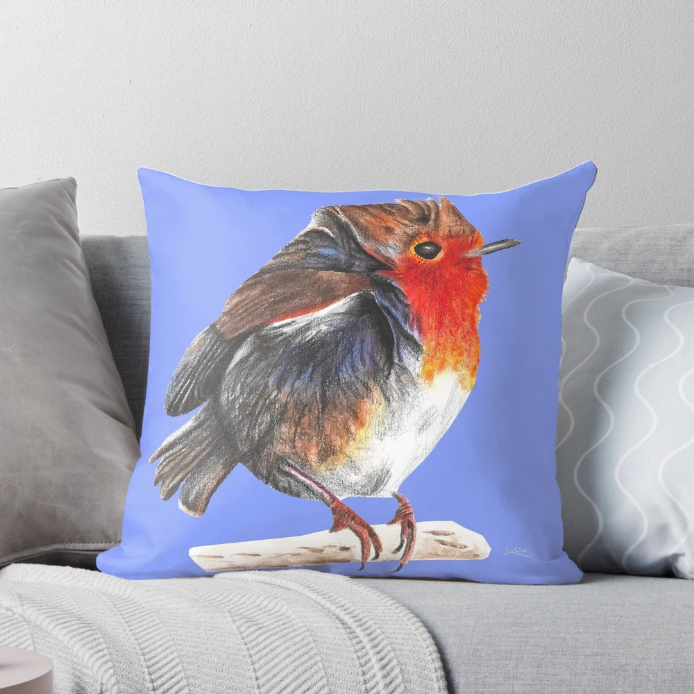 Decorative pillow featuring a beautiful robin bird in a winter nature scene