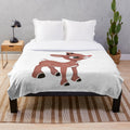 Soft and cozy plush blanket featuring the classic Rudolph the Red Nosed Reindeer design