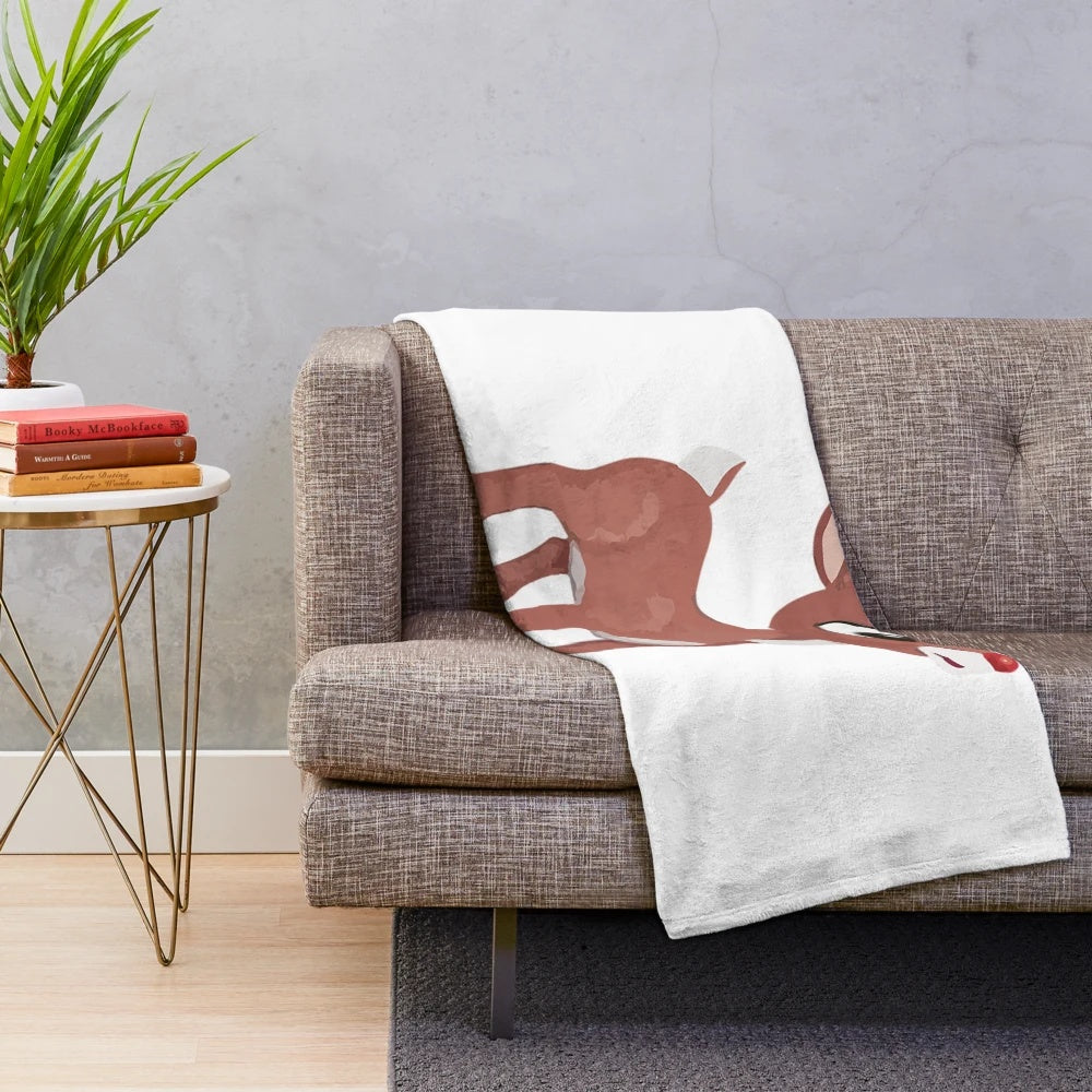 Soft and cozy plush blanket featuring the classic Rudolph the Red Nosed Reindeer design
