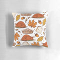 Cozy thanksgiving-themed pillow with fall leaves, turkey, and nuts design