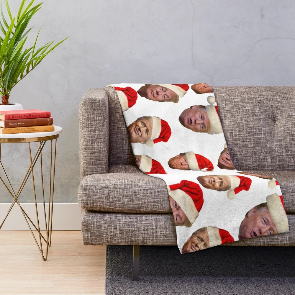 Trump-themed plush blanket with festive design