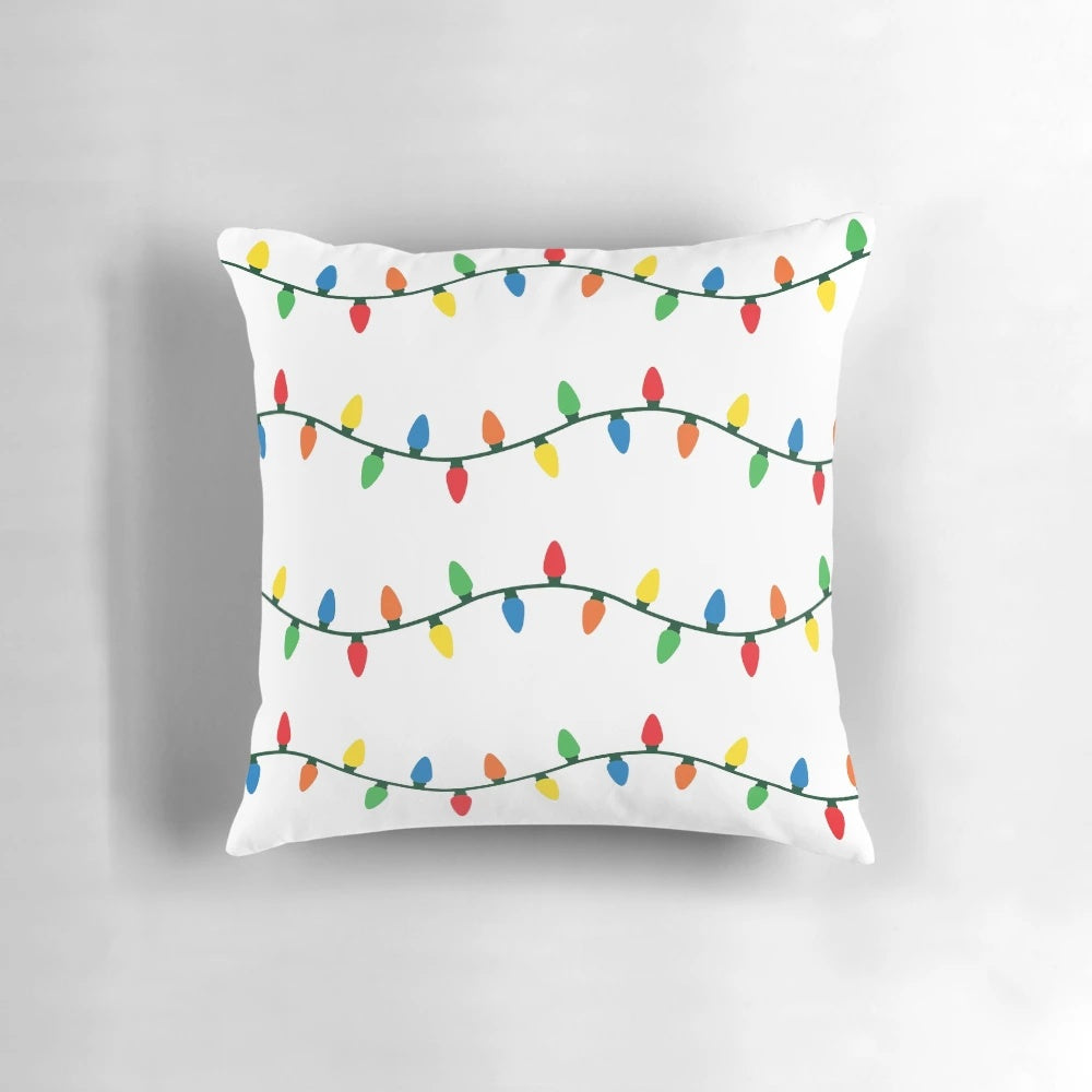 Twinkling Christmas lights pillow with a festive design, perfect for holiday home decor