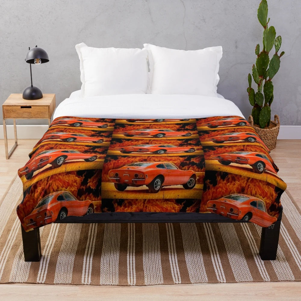 Plush blanket with fiery Opel-inspired design