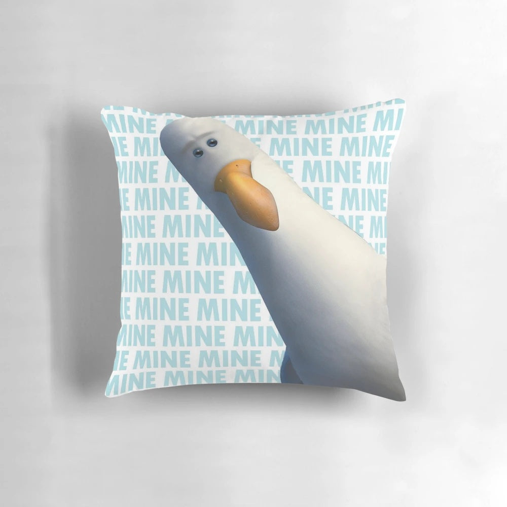 A throw pillow featuring the seagull from the movie Finding Nemo saying "Mine, mine, mine!