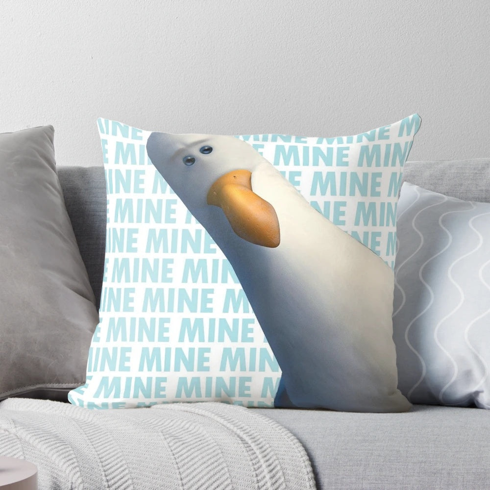 A throw pillow featuring the seagull from the movie Finding Nemo saying "Mine, mine, mine!