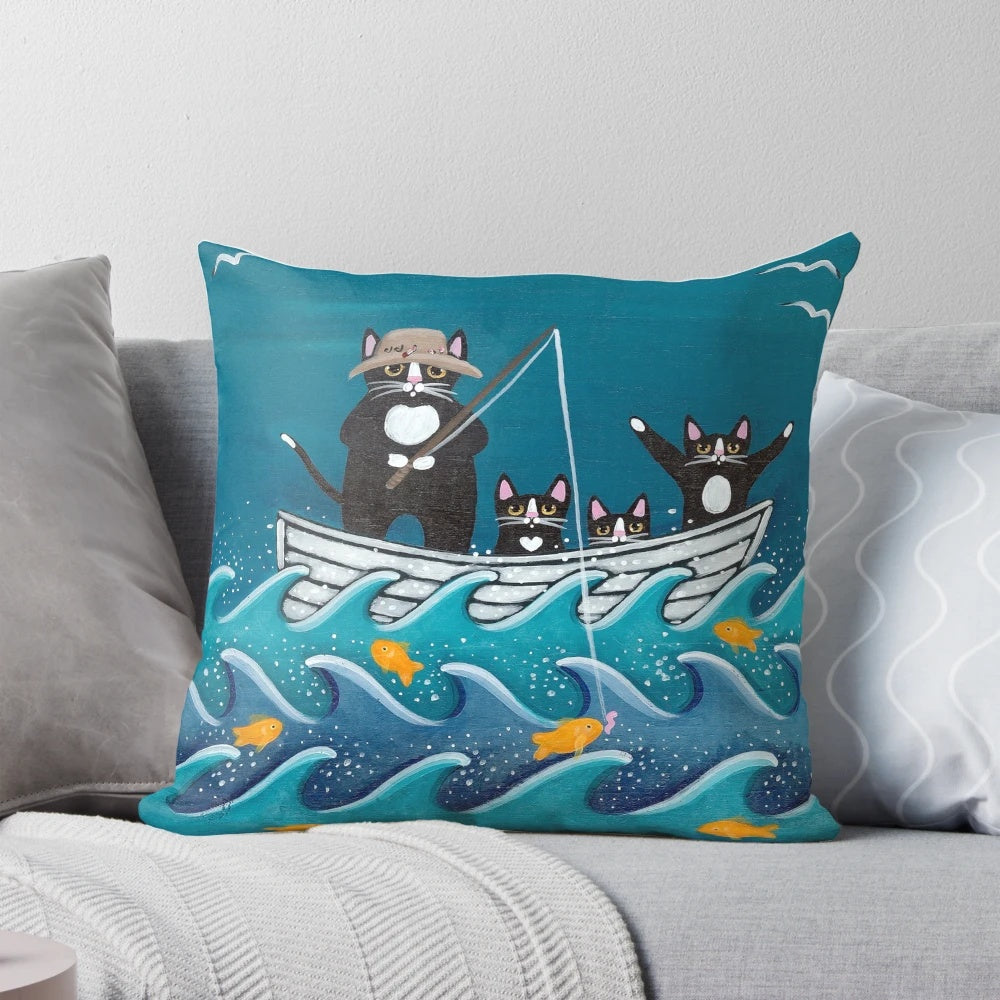 Pillow featuring a father and child fishing on a boat with cats and fish in the water