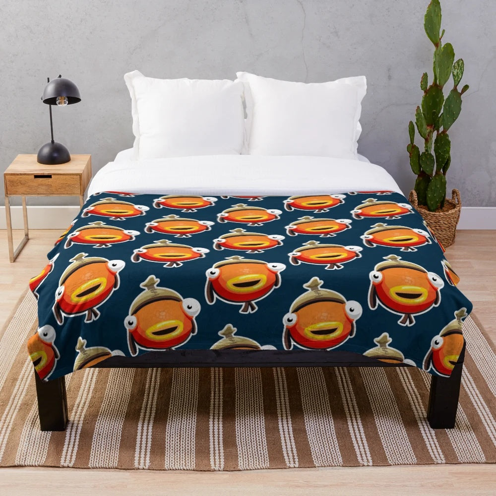 Fishy themed plush blanket featuring a shadow monster from the popular video game Fortnite