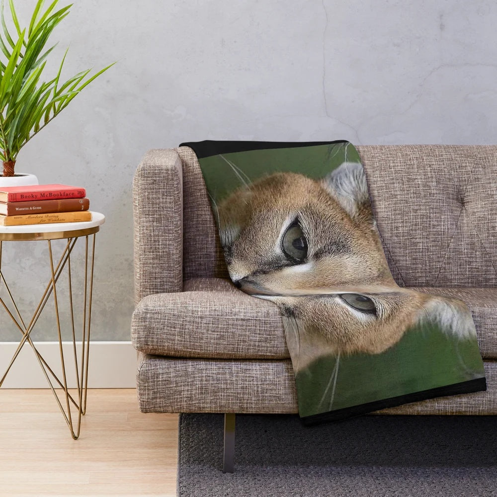 Floppa Caracal plush blanket featuring a playful and cuddly big cat design
