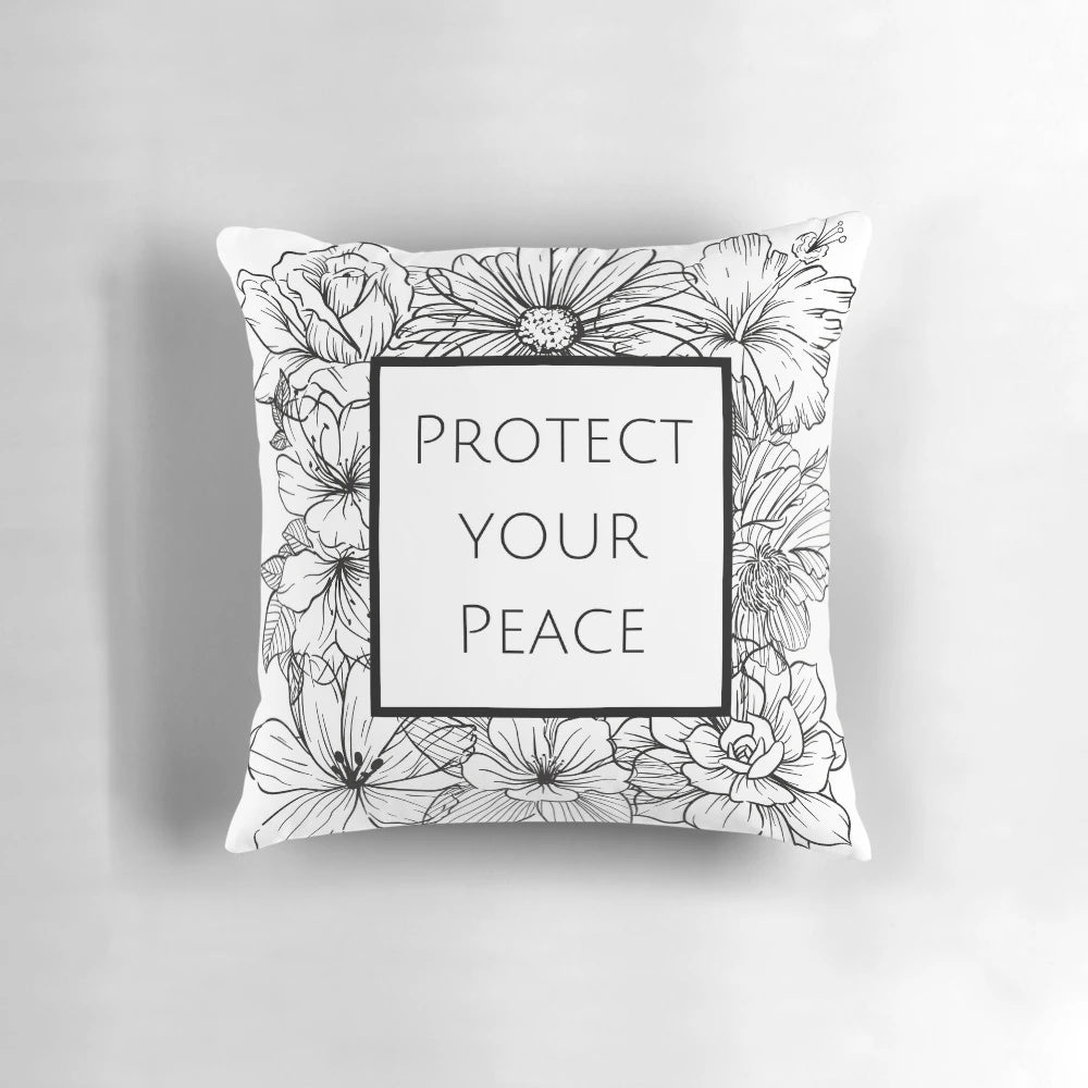 Floral black and white design pillow with the text "Protect your Peace