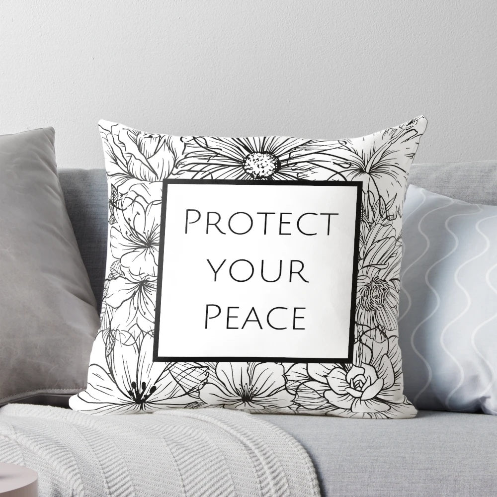 Floral black and white design pillow with the text "Protect your Peace