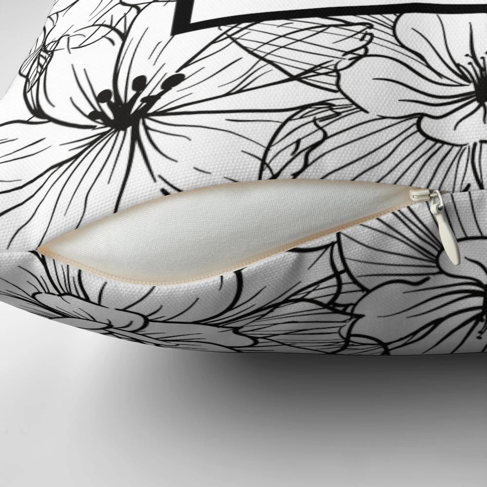 Floral black and white design pillow with the text "Protect your Peace
