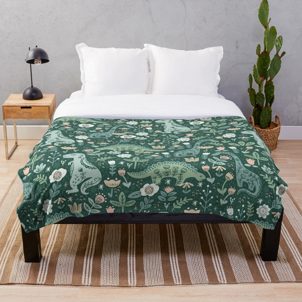 Cozy floral dinosaur plush blanket with folk art inspired design