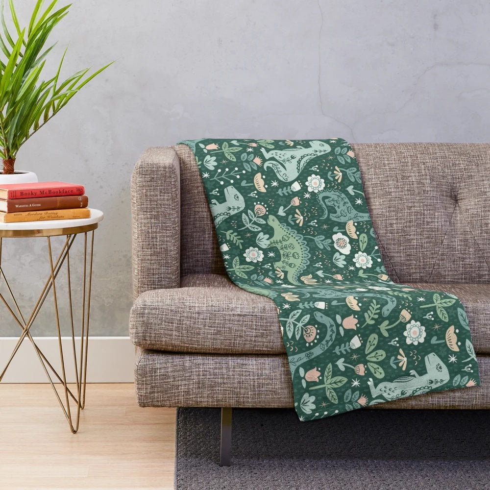 Cozy floral dinosaur plush blanket with folk art inspired design