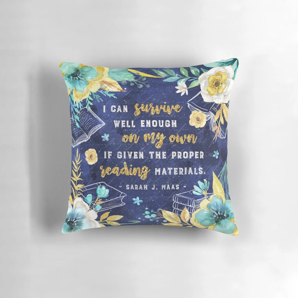 A beautifully crafted pillow featuring a watercolor-inspired floral design in shades of turquoise, teal, and gold, perfect for book lovers and fantasy fans.