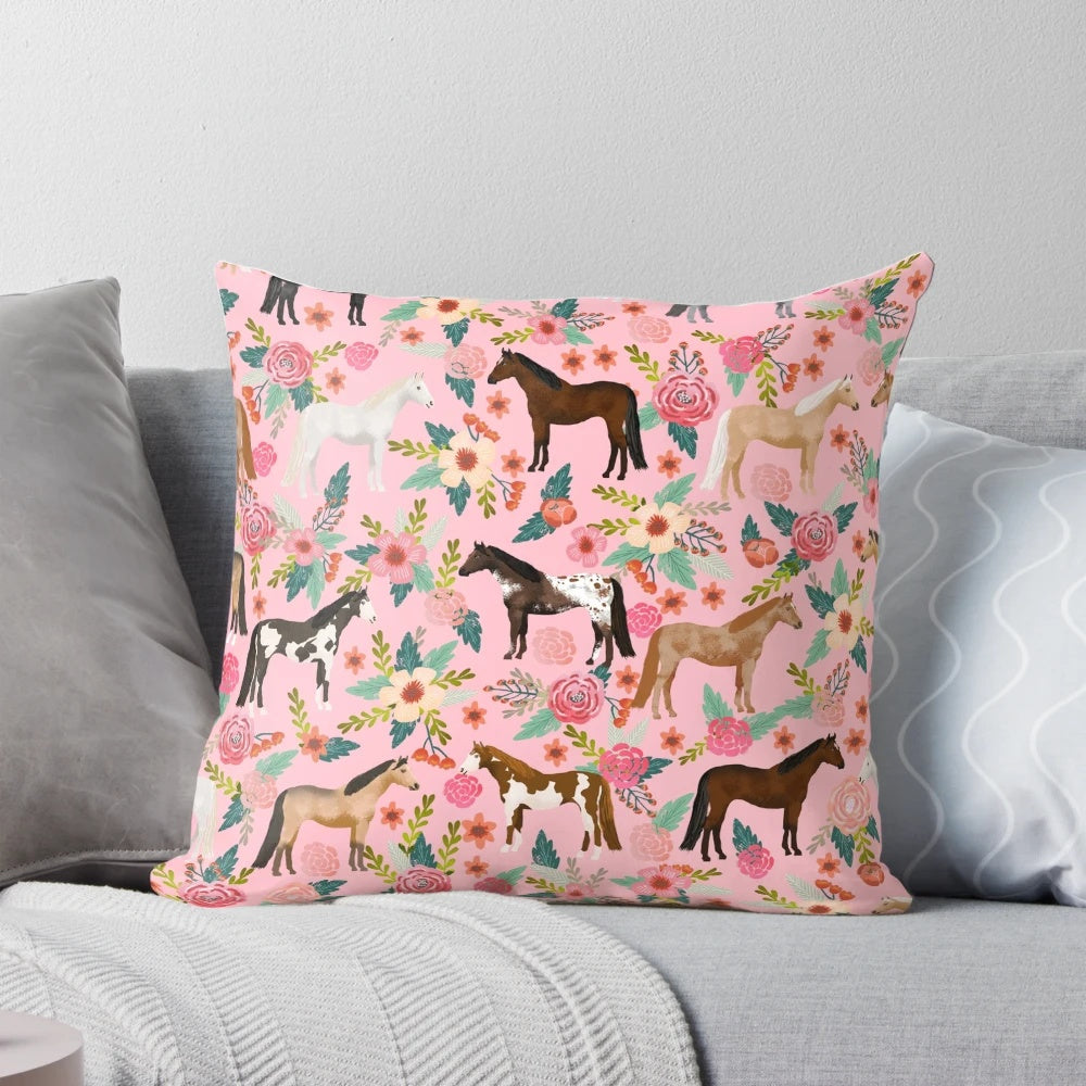 Soft, decorative pillow featuring a colorful floral pattern and various horse breeds