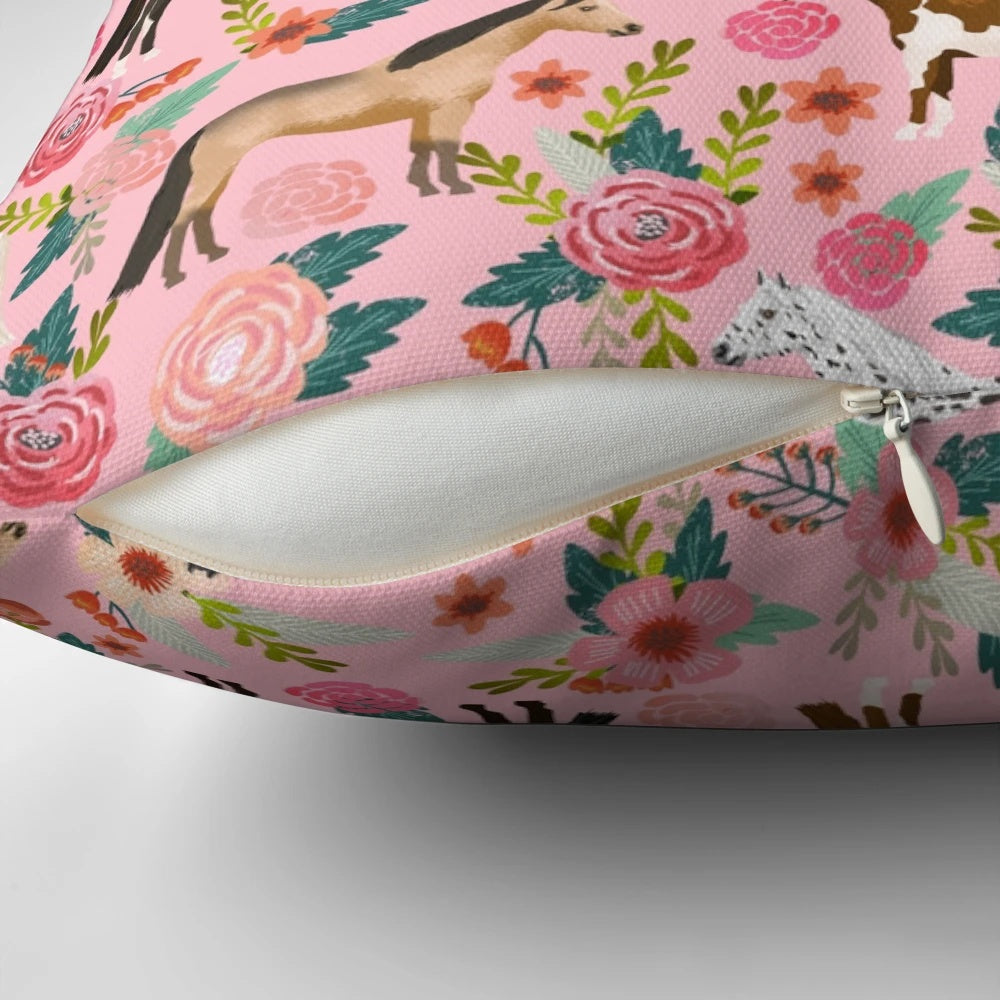 Soft, decorative pillow featuring a colorful floral pattern and various horse breeds