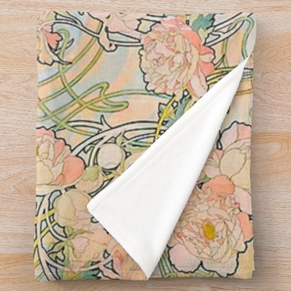 Plush blanket featuring a floral design inspired by the art nouveau style of Alphonse Mucha