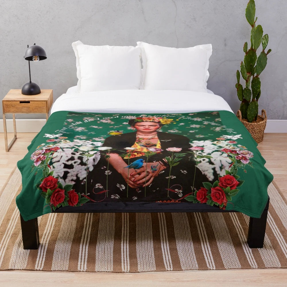 Floral plush blanket featuring Frida Kahlo's artwork and inspirational imagery