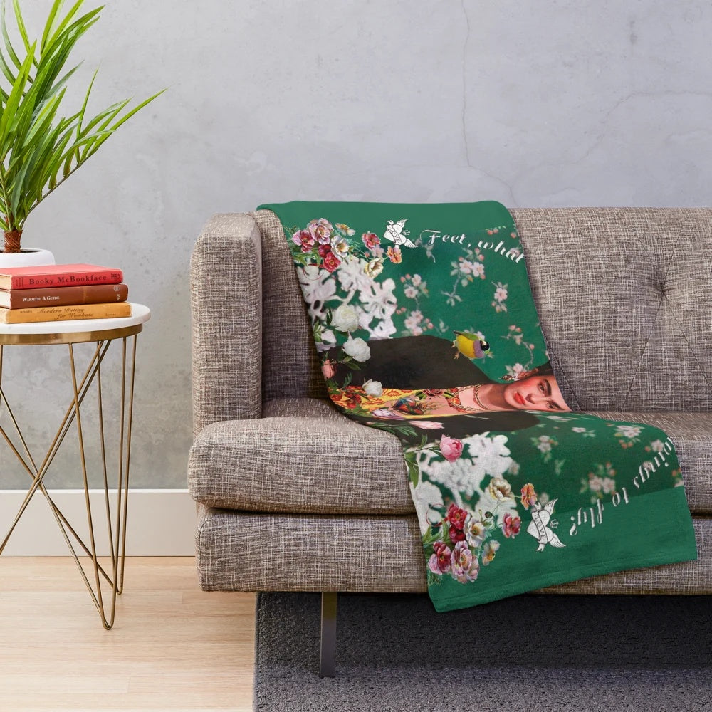 Floral plush blanket featuring Frida Kahlo's artwork and inspirational imagery