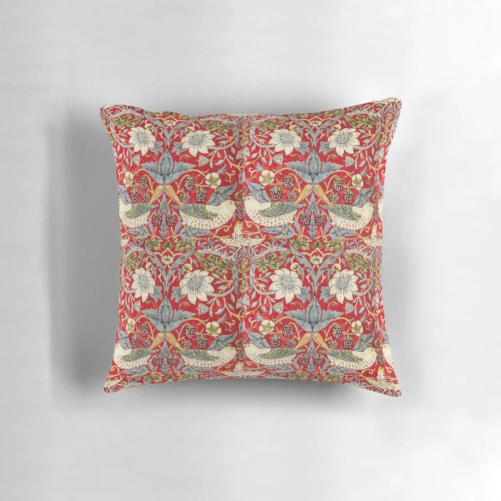 Decorative floral throw pillow featuring the iconic "Strawberry Thief" design by William Morris
