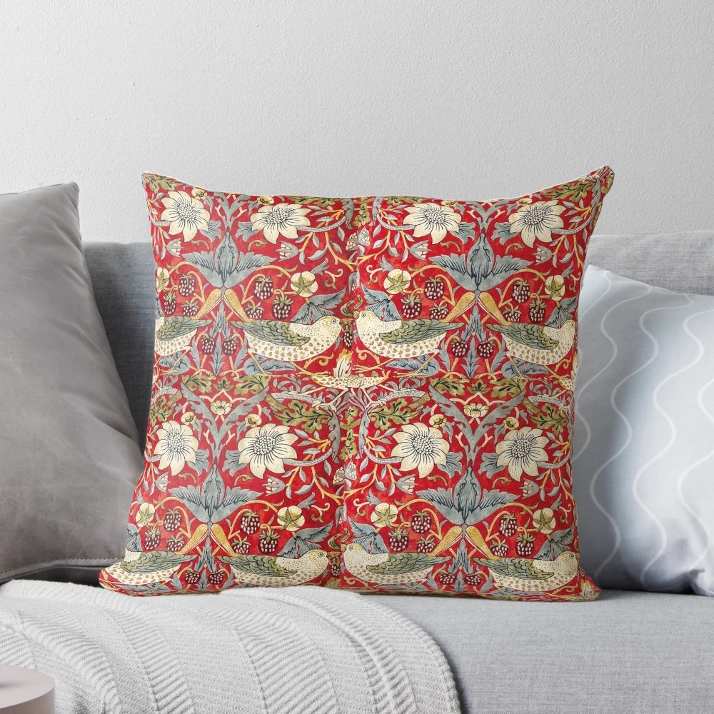Decorative floral throw pillow featuring the iconic "Strawberry Thief" design by William Morris