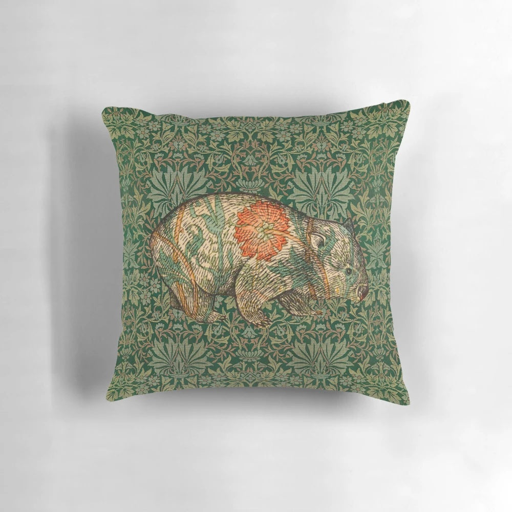 Decorative pillow featuring a wombat in a green floral garden, inspired by the art of Dante Gabriel Rossetti and William Morris