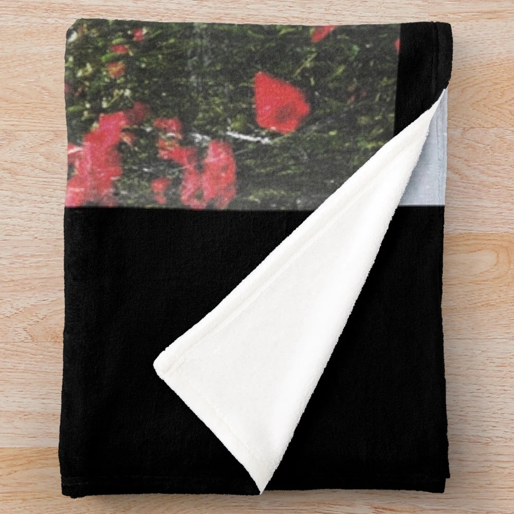 Plush blanket with an image of the famous Barry Wood meme in a flower field