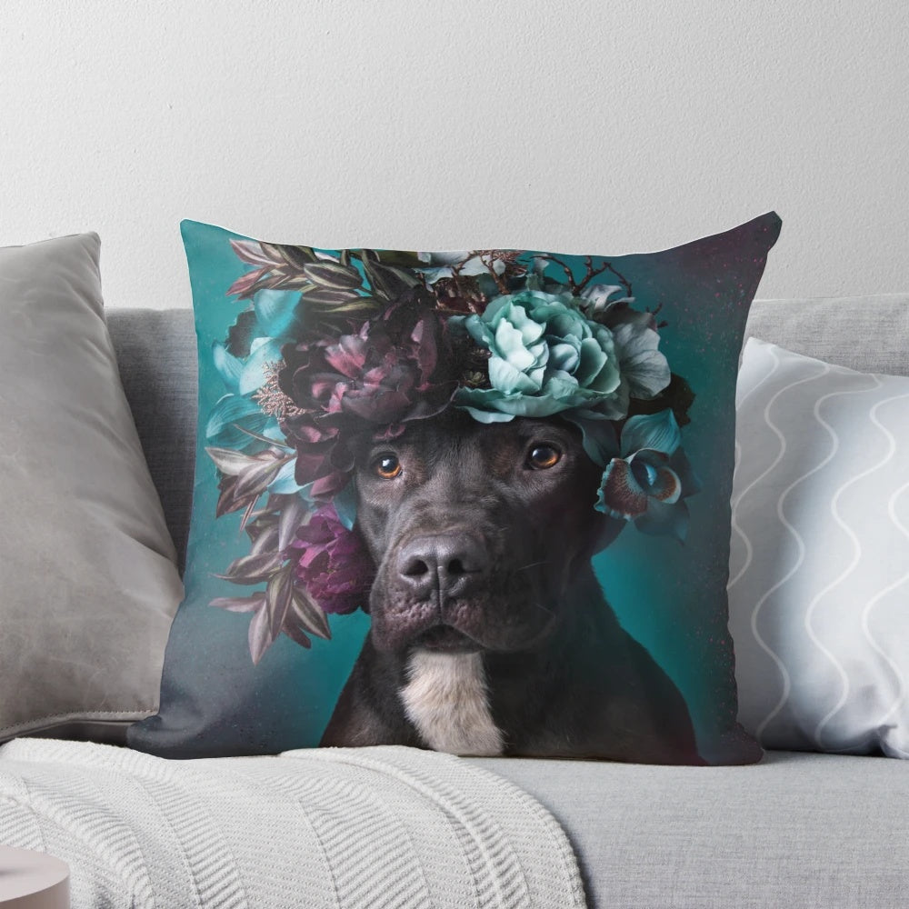 A floral-adorned Aden pillow, featuring a pit bull wearing a flower crown, symbolizing love and rescue for dogs.