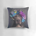 A Flower Power-themed pillow featuring a portrait of a pitbull dog with a flower crown.
