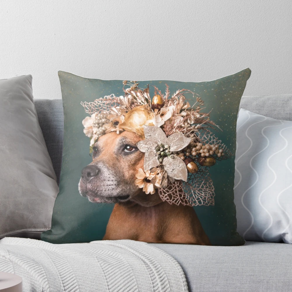 A vibrant, flower-adorned pillow featuring a playful pitbull puppy, symbolizing the joy and hope of animal rescue.