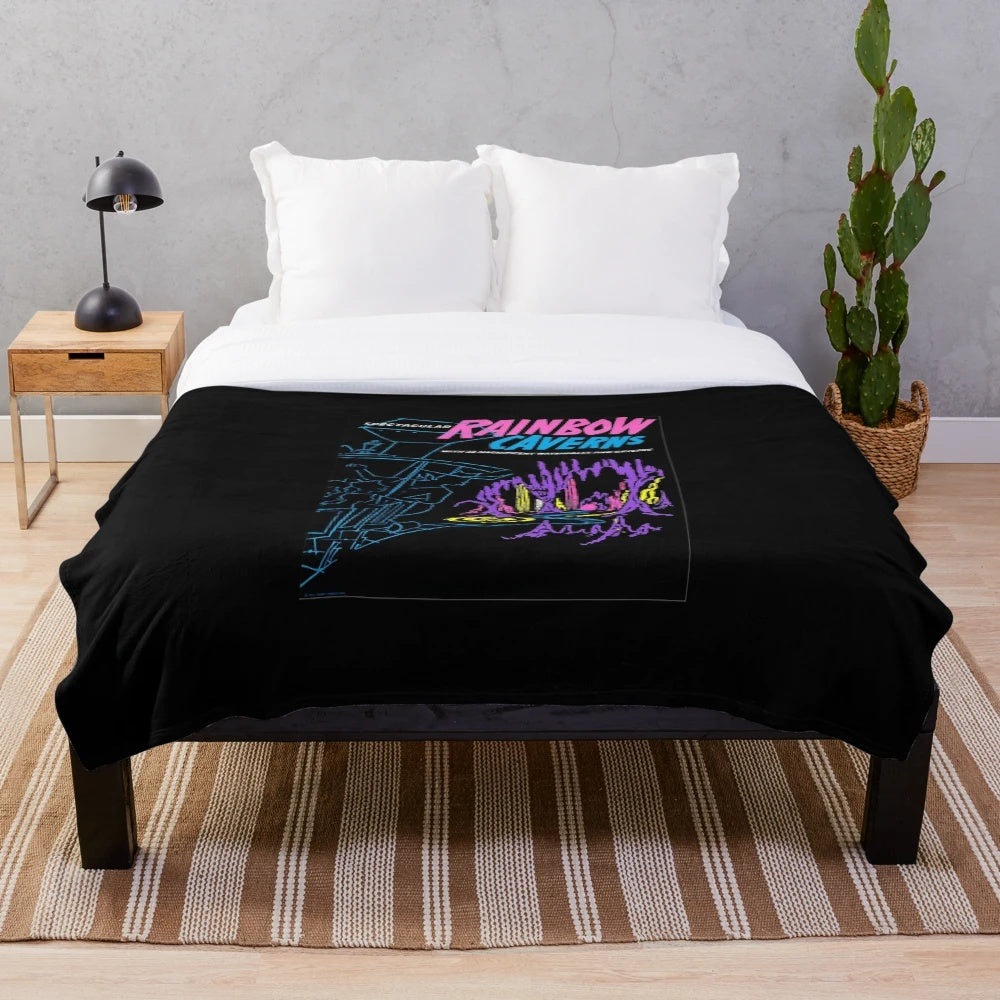 Colorful plush blanket with Flume-inspired rave and rainbow caverns design