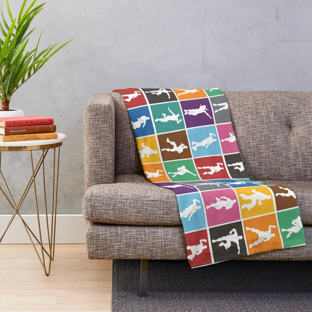 Vibrant rainbow lattice pattern plush blanket featuring a Fortnite-inspired victory dance design