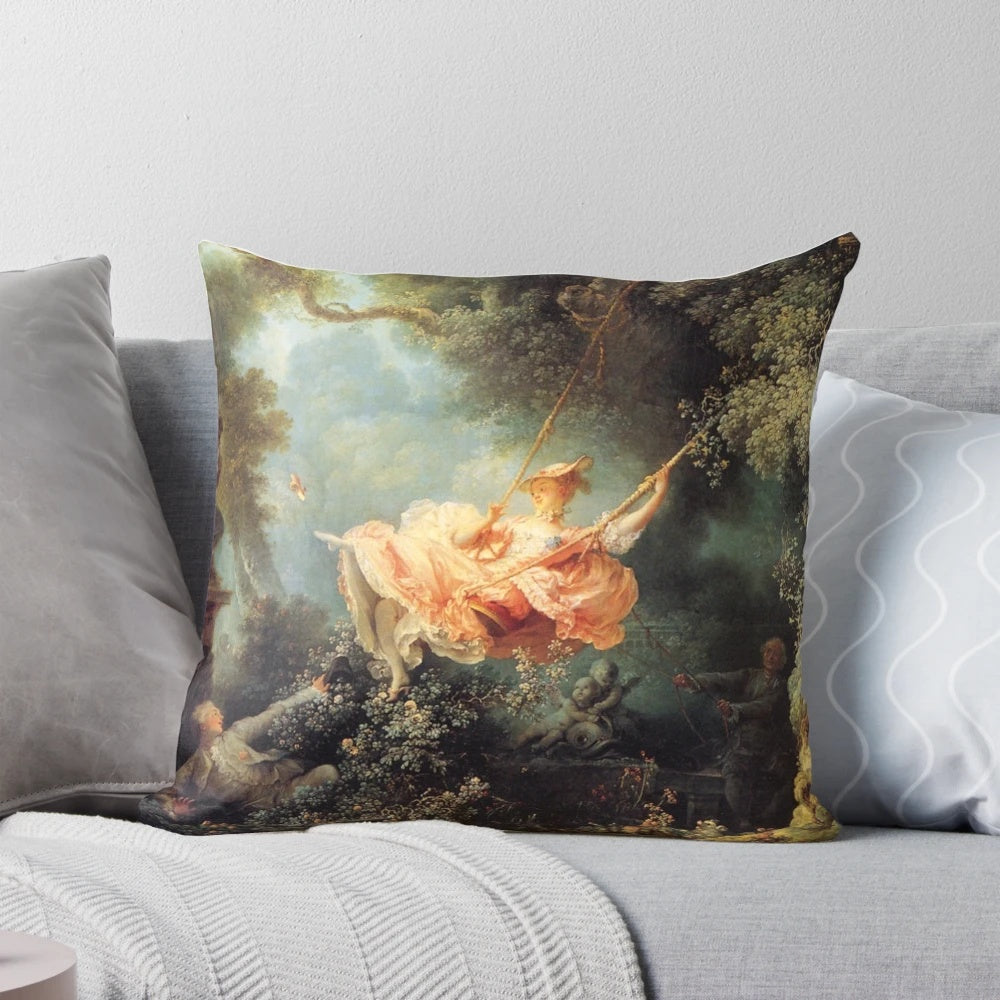 Decorative pillow featuring the famous painting "The Swing" by French artist Jean-Honoré Fragonard, displayed in the Louvre Museum in Paris.
