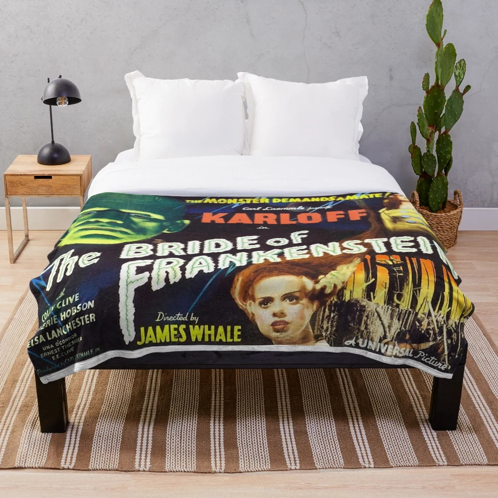 Plush blanket featuring Frankenstein's monster and his bride