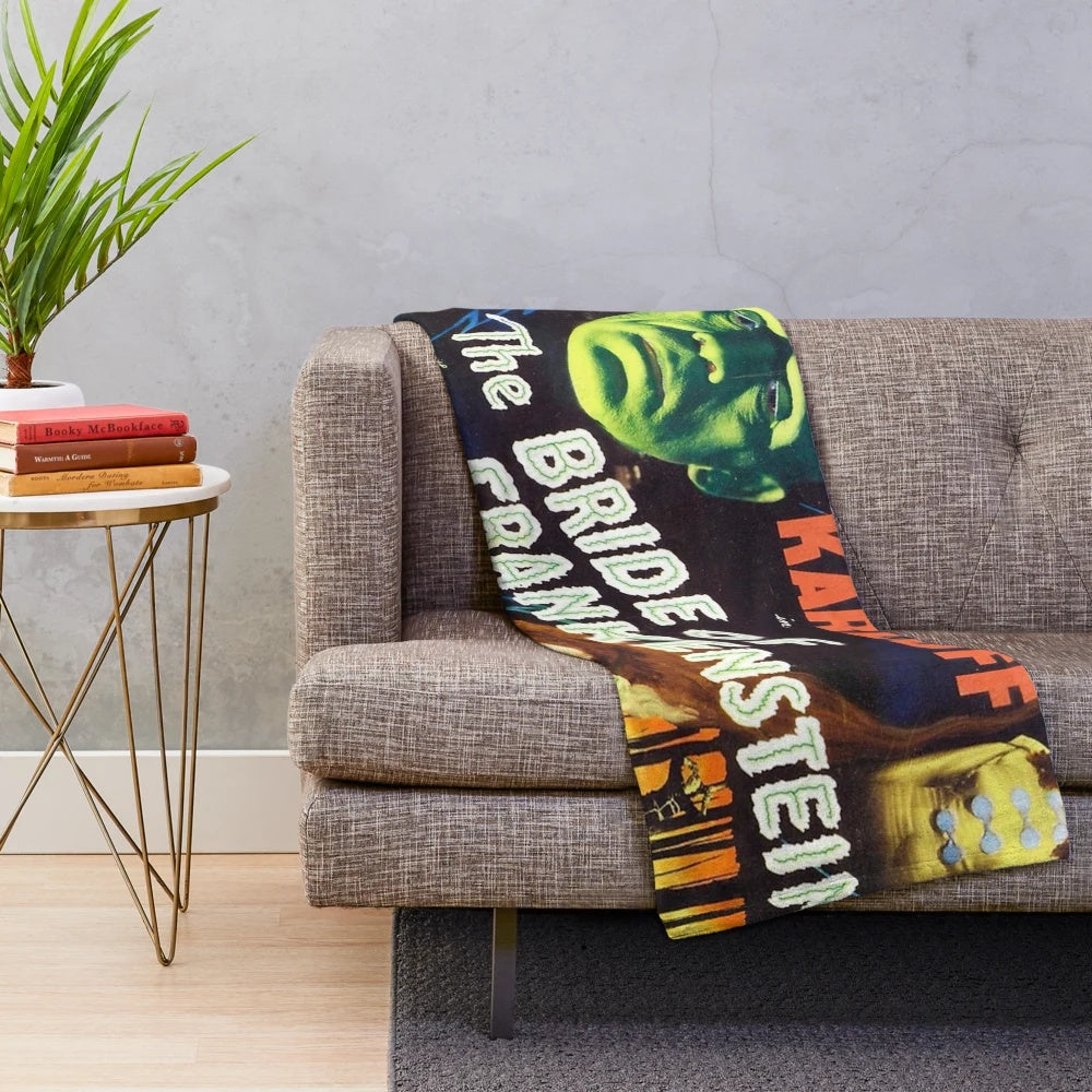 Plush blanket featuring Frankenstein's monster and his bride
