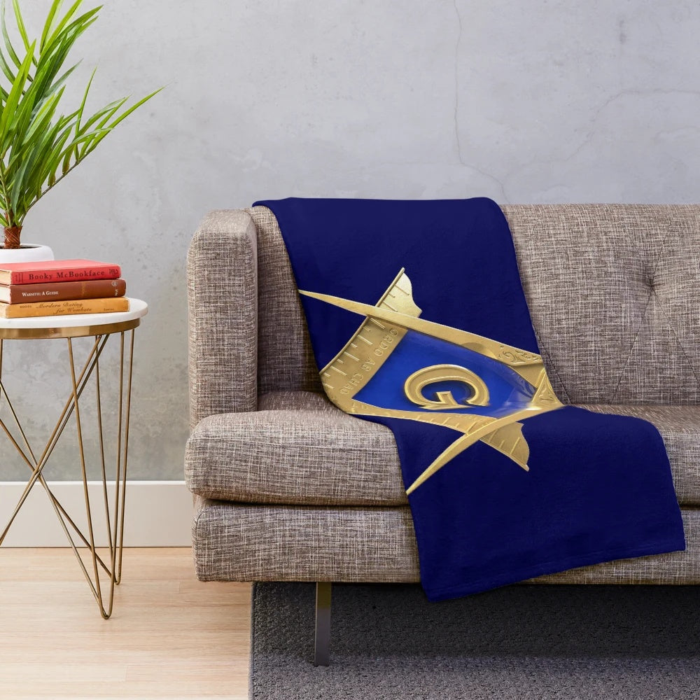 Freemason-inspired blue and gold plush blanket with square and compass masonic symbol