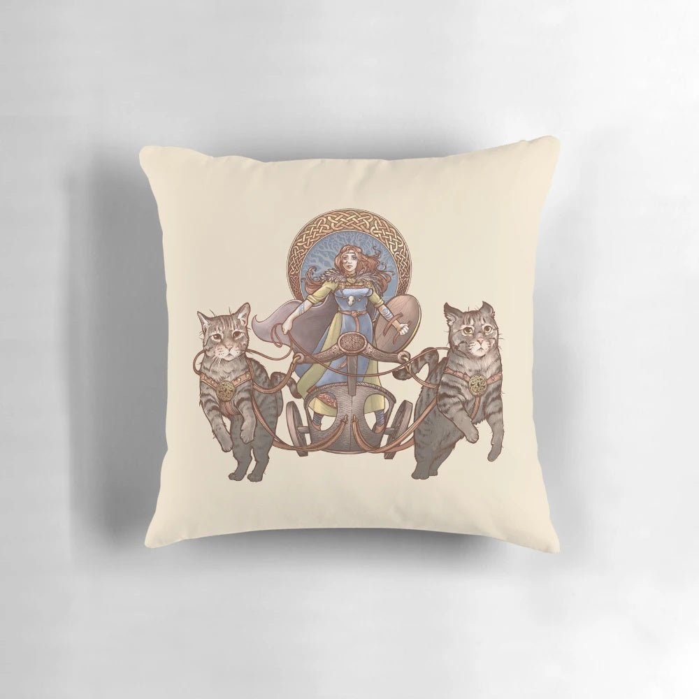Decorative throw pillow depicting the Norse goddess Freya riding a chariot drawn by cats