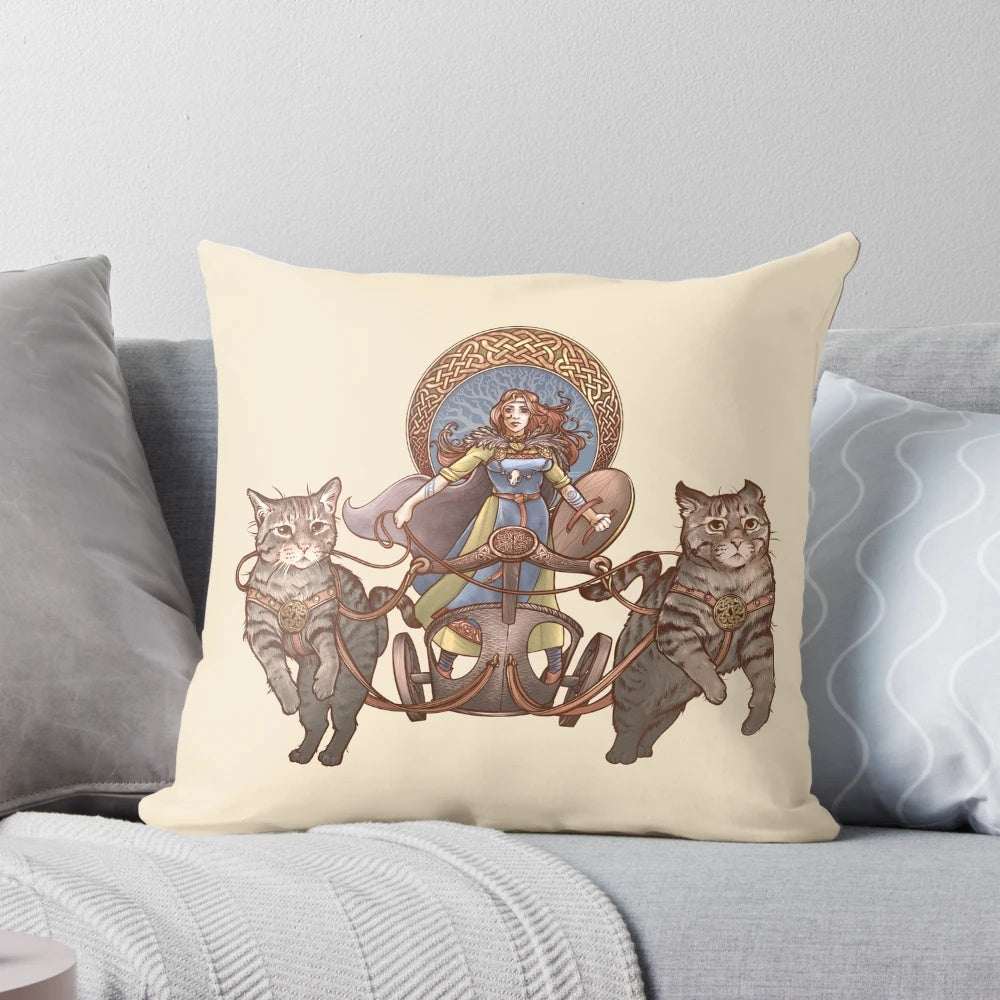 Decorative throw pillow depicting the Norse goddess Freya riding a chariot drawn by cats