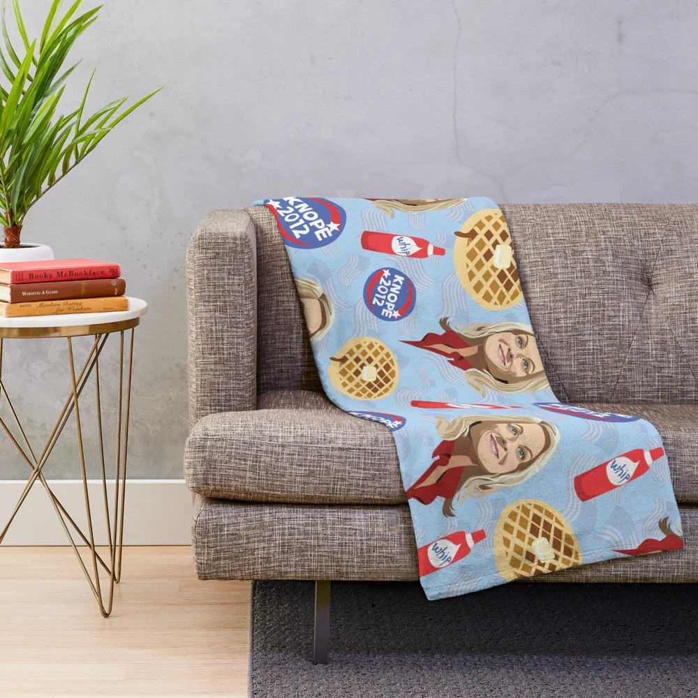 Friends, Waffles, and Work" themed plush blanket featuring beloved Parks and Recreation characters
