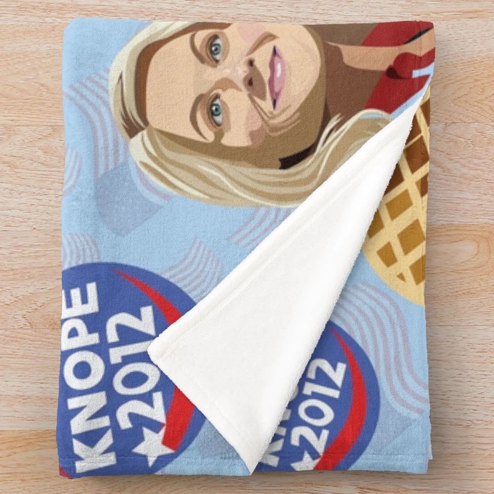 Friends, Waffles, and Work" themed plush blanket featuring beloved Parks and Recreation characters
