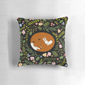 Decorative pillow featuring a whimsical print of a fox and rabbit in a floral and leaf pattern, perfect for animal lovers and friends.