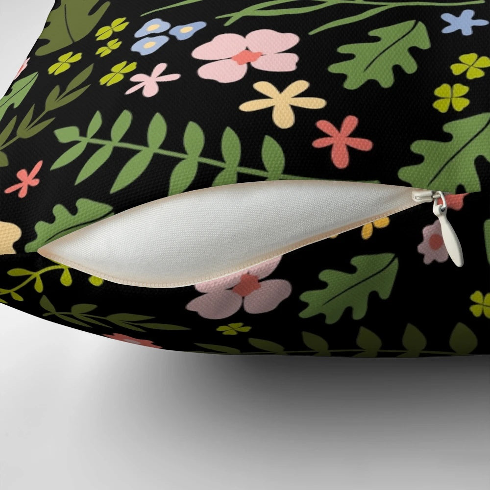 Decorative pillow featuring a whimsical print of a fox and rabbit in a floral and leaf pattern, perfect for animal lovers and friends.
