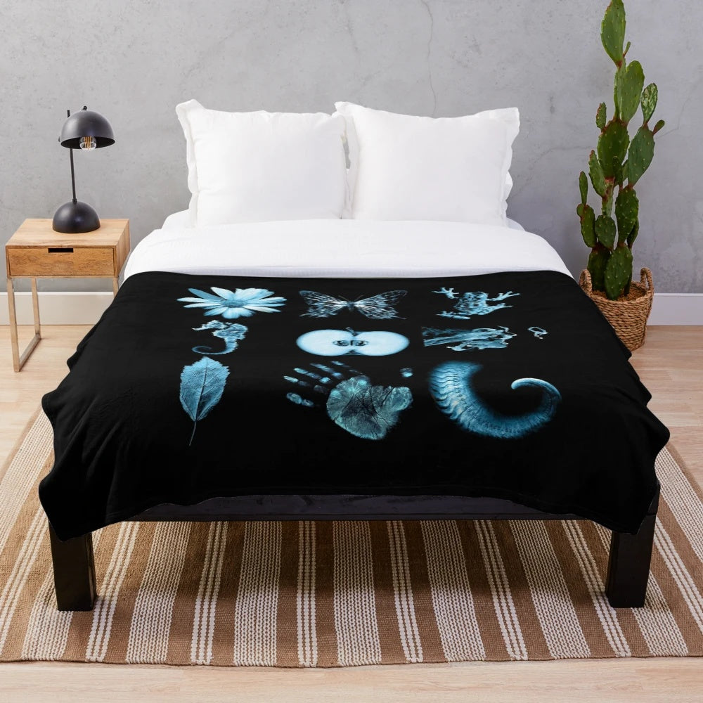 Fringe Glyph Plush Blanket featuring nine iconic symbols from the sci-fi TV series