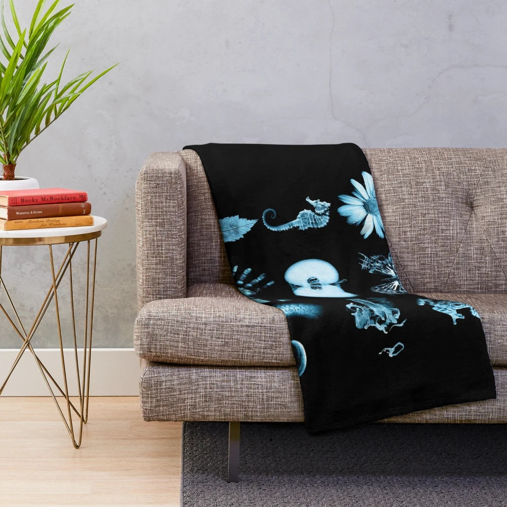 Fringe Glyph Plush Blanket featuring nine iconic symbols from the sci-fi TV series