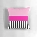 Fuchsia, black, and white striped decorative pillow