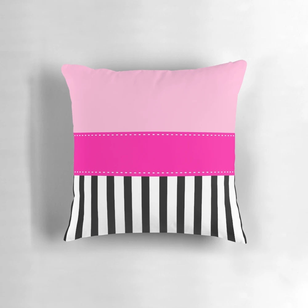 Fuchsia, black, and white striped decorative pillow