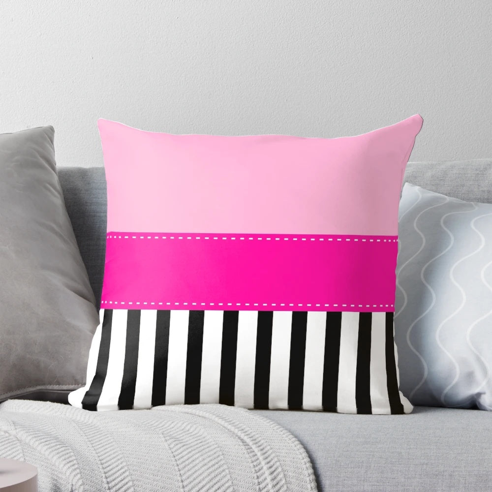Fuchsia, black, and white striped decorative pillow