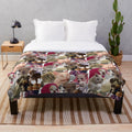Colorful plush blanket featuring a collage of popular animal memes