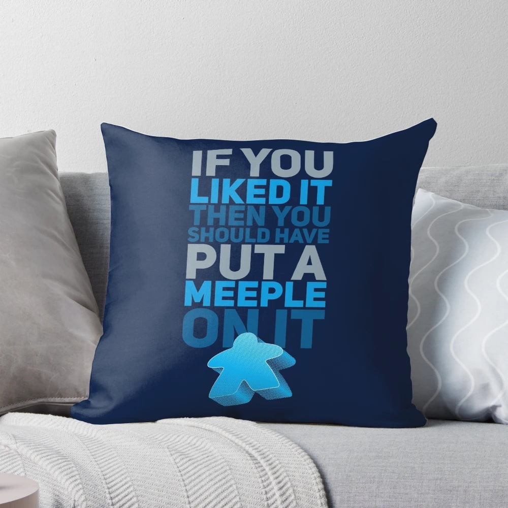 A decorative pillow featuring a funny "Should Have Put a Meeple On It" design, perfect for board game enthusiasts.